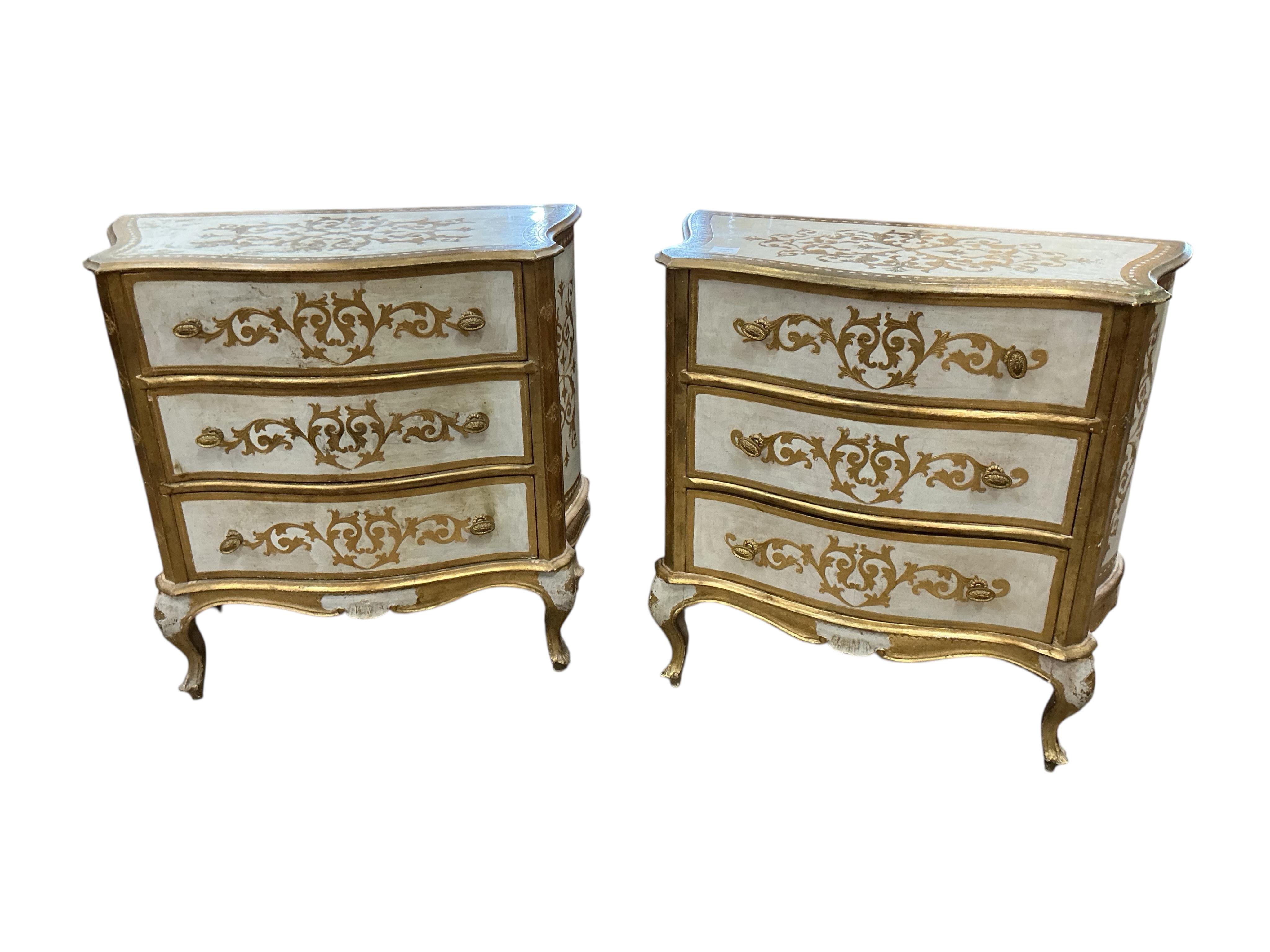 A pair of Northern Italian parcelgilt serpentine three drawer bedside chests, width 69cm, depth 38cm, height 78cm